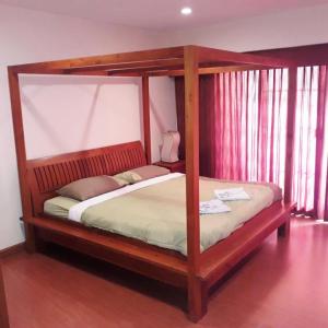 Säng eller sängar i ett rum på VIP Condochain Rayong