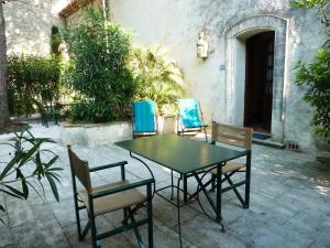 Een patio of ander buitengedeelte van Les Bastidieres - Cap Brun
