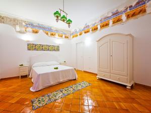 A bed or beds in a room at Punta Sallustro Lipari