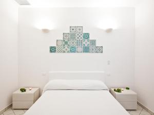 Postel nebo postele na pokoji v ubytování Punta Sallustro Lipari