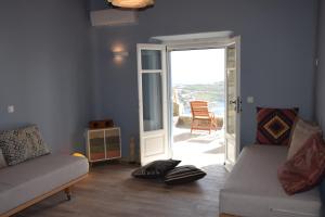 Кът за сядане в Andromeda Mykonos Villas & Suites