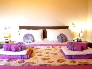 Кровать или кровати в номере villaggio casina del duca