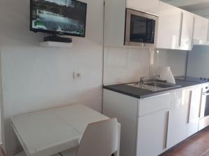 Kuchyň nebo kuchyňský kout v ubytování Loft La Tahonilla
