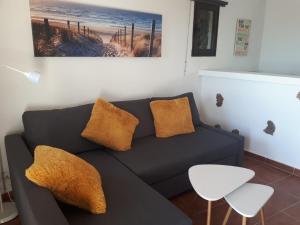 Posezení v ubytování Loft La Tahonilla