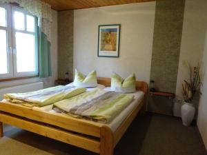 Posteľ alebo postele v izbe v ubytovaní Ferienhausanlage Juhrs
