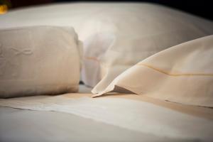 Posteľ alebo postele v izbe v ubytovaní Massimo Plaza Hotel