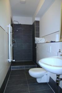 A bathroom at Apartment Caplex