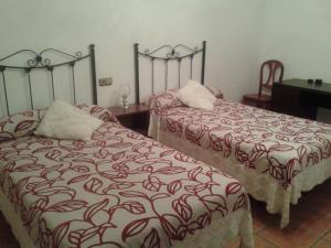 Cama o camas de una habitación en El Hogar de Ardwina
