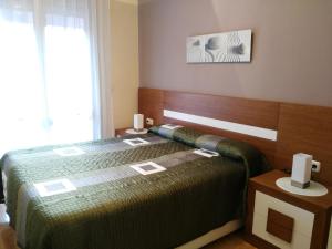 Posteľ alebo postele v izbe v ubytovaní Apartamento turistico Olite