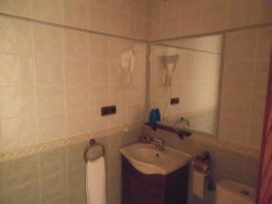 Kúpeľňa v ubytovaní Hostal Los Galgos