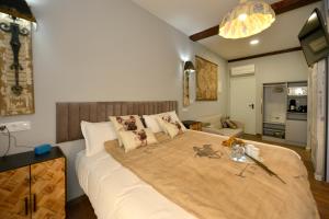 เตียงในห้องที่ Center Suite Santander