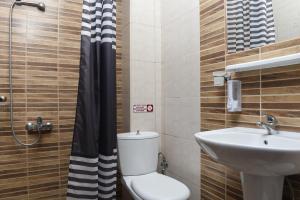 Koupelna v ubytování Hotel Paris