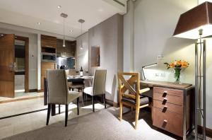 A kitchen or kitchenette at Eurostars Suites Mirasierra