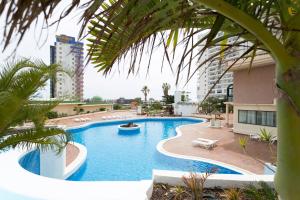 Bazén v ubytovaní 906 lUXURY PARAíSO SEA VIEW alebo v jeho blízkosti