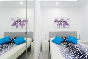 Posteľ alebo postele v izbe v ubytovaní 906 lUXURY PARAíSO SEA VIEW