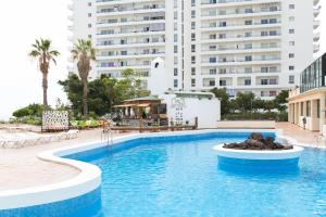 Bazén v ubytovaní 906 lUXURY PARAíSO SEA VIEW alebo v jeho blízkosti
