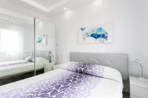 Posteľ alebo postele v izbe v ubytovaní 906 lUXURY PARAíSO SEA VIEW