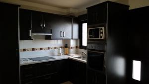 Kuchyňa alebo kuchynka v ubytovaní Vivienda Vacacional Monteprimero 2