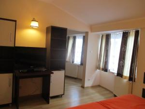 Łóżko lub łóżka w pokoju w obiekcie Hotel Pod Platanami