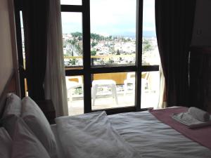 Cama o camas de una habitación en West Ada Hotel&SPA