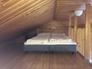 1 cama en el ático de una habitación en Villa Casanova, en Levi