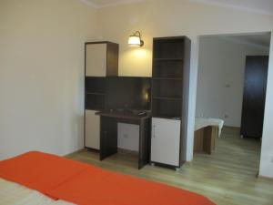 Łóżko lub łóżka w pokoju w obiekcie Hotel Pod Platanami