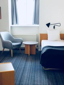 Postelja oz. postelje v sobi nastanitve Hotel Garni
