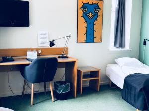 Postelja oz. postelje v sobi nastanitve Hotel Garni