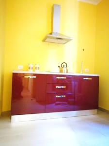 a kitchen with a sink and a counter top at La Caravella apartament in Rapallo