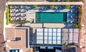 an overhead view of a building with a swimming pool at Sant Francesc Hotel Singular in Palma de Mallorca