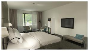 TV a/nebo společenská místnost v ubytování Van der Valk Hotel Hilversum/ De Witte Bergen