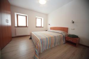 Rúm í herbergi á Albergo diffuso Valcellina e Val Vajont in Cimolais