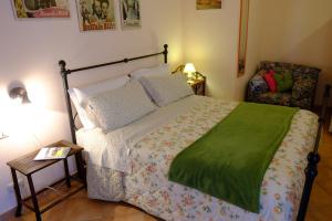 En eller flere senger på et rom på Agriturismo La Roverella