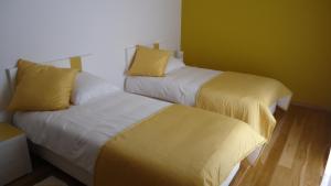 Uma cama ou camas num quarto em Casa da Ladeira, Turismo Rural