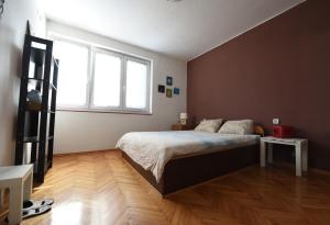 Postel nebo postele na pokoji v ubytování Square Vanilla Apartments