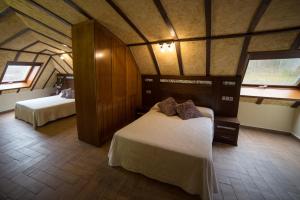 Postel nebo postele na pokoji v ubytování Hotel Casa Beletri