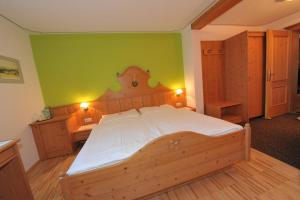 Postel nebo postele na pokoji v ubytování Haus Helga