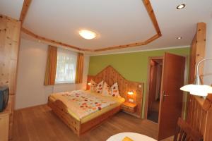 Postel nebo postele na pokoji v ubytování Haus Helga