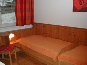 Postel nebo postele na pokoji v ubytování Haus Helga