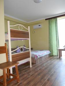 Postel nebo postele na pokoji v ubytování Magnetic Sand Hotel