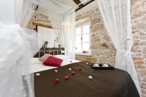 Posteľ alebo postele v izbe v ubytovaní Apartments Santa Lucia Exclusive