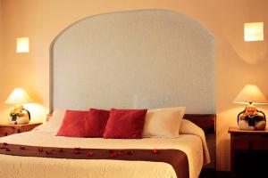 Postel nebo postele na pokoji v ubytování Hotel Posada Real Tapalpa