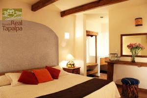 Postel nebo postele na pokoji v ubytování Hotel Posada Real Tapalpa