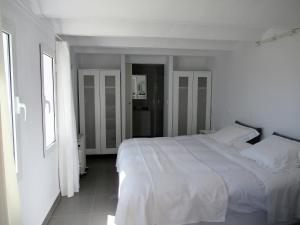 Postel nebo postele na pokoji v ubytování Casa Blanca