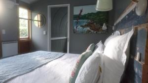 Postel nebo postele na pokoji v ubytování Waitapu Springs B&B