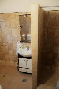 Koupelna v ubytování Casa Demeter