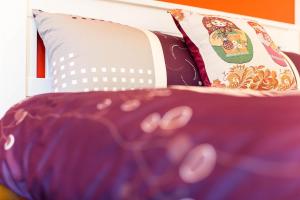 Una cama o camas en una habitación de 春夏秋冬民宿