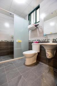Un baño de 春夏秋冬民宿