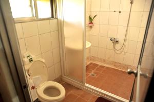 Ванна кімната в Fengnan Tianzhuang Homestay