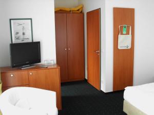 Postel nebo postele na pokoji v ubytování Haus Köbesine